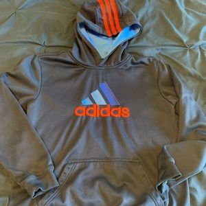 Adidas navy blue hoodie with orange writing.